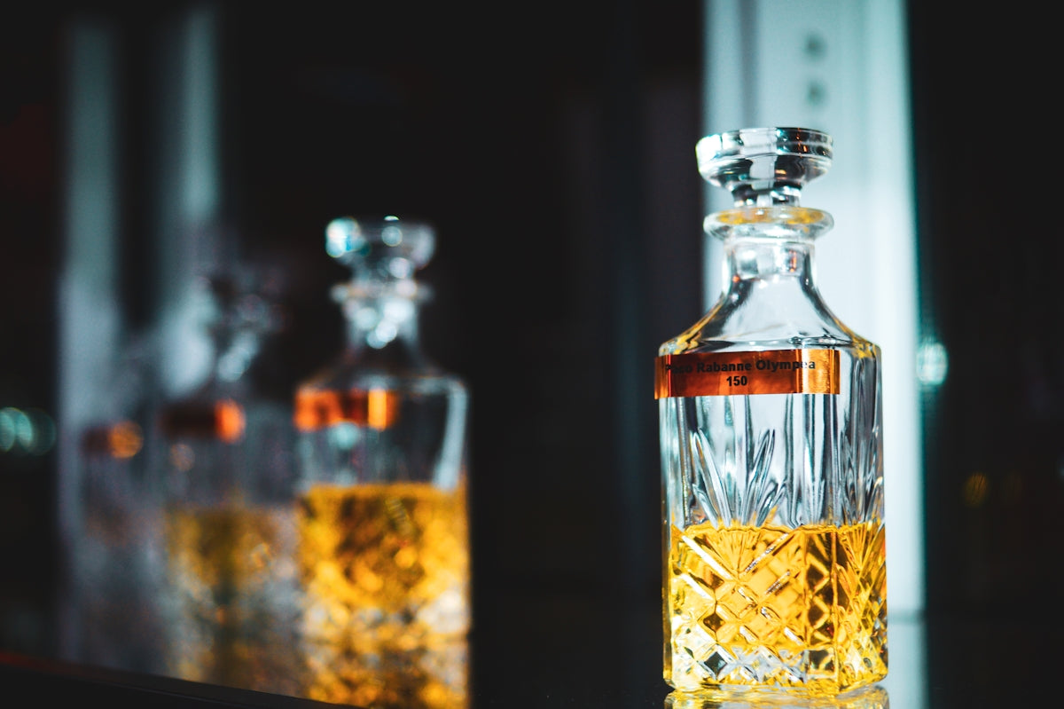 a bottle of whiskey sitting on top of a counter